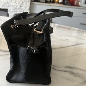 Black canvas authentic Ferragamo bag in excellent condition with logo !